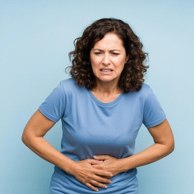 Person holding their stomach, illustrating digestive discomfort